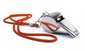 Metal whistle isolated on white